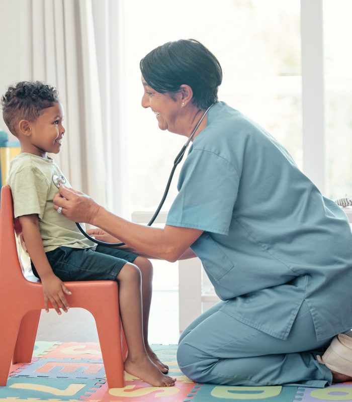 Paediatrician, children doctor and consultation of a healthcare employee check heart health. Family